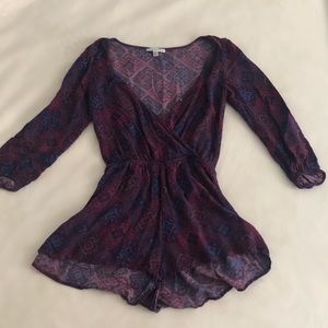 Plunging neckline long sleeve romper